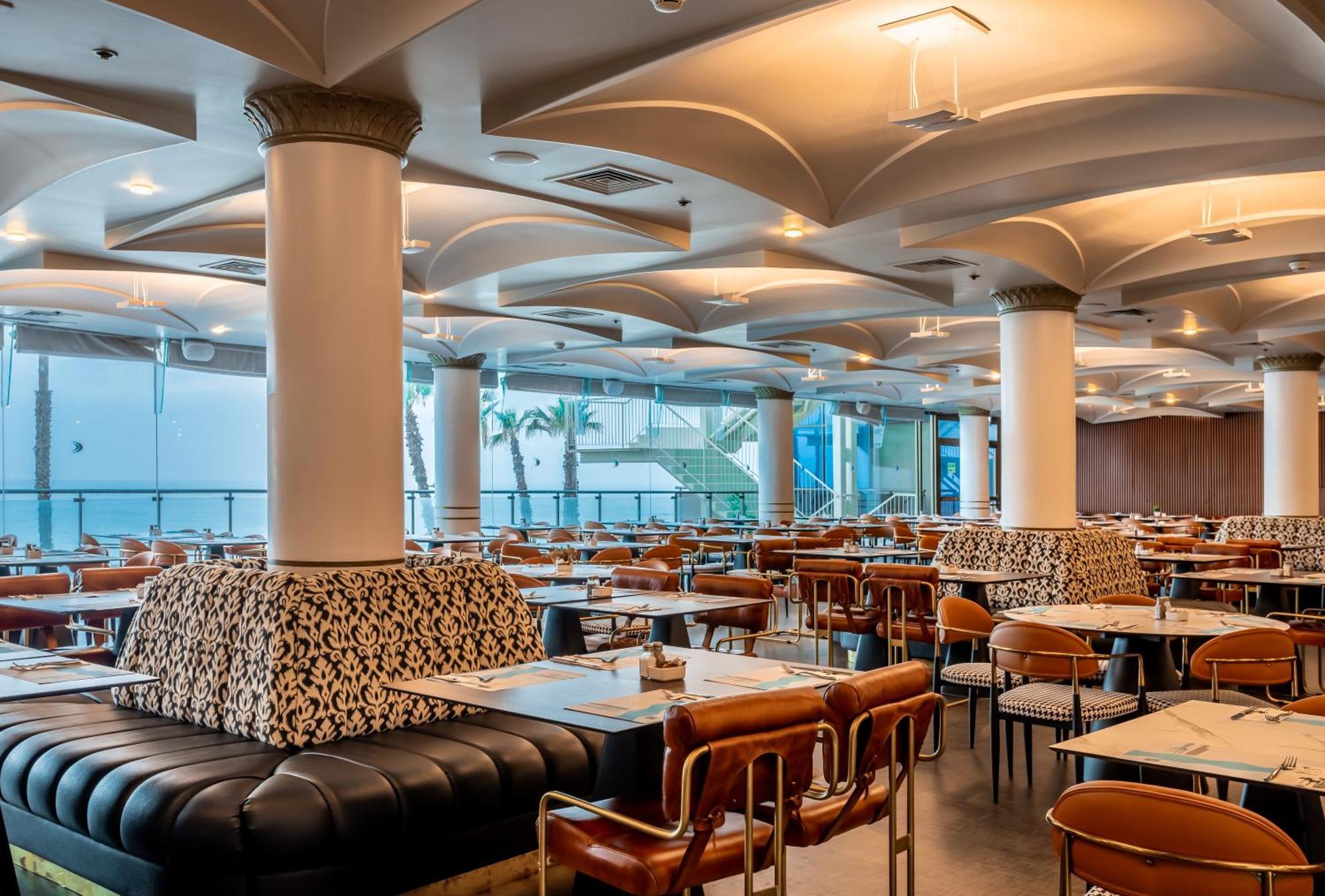 ダニエル ヘルツリーヤ ホテル Herzelia エクステリア 写真 The interior of the restaurant